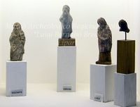 FIG. 13 - Statuette fittili raffiguranti personaggi illustri (Omero, Socrate, Lisia).